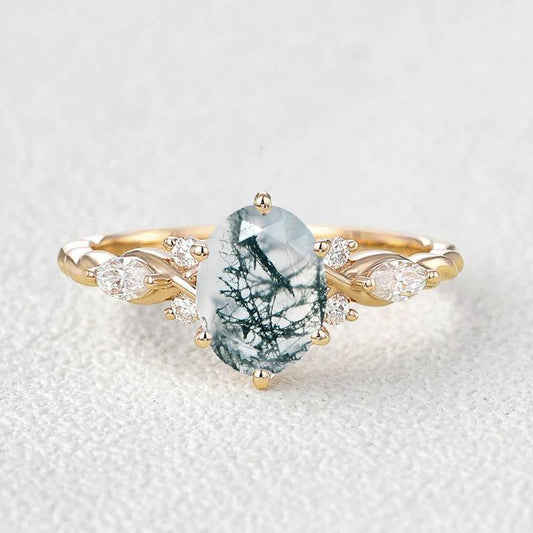 Flora’s Eternal | Oval Moss Agate Infinity Engagement Ring.