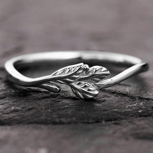 The Minimalist Pair – Classic & Leaf Designs in Polished Wedding Bands.