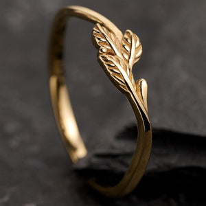The Minimalist Pair – Classic & Leaf Designs in Polished Wedding Bands.