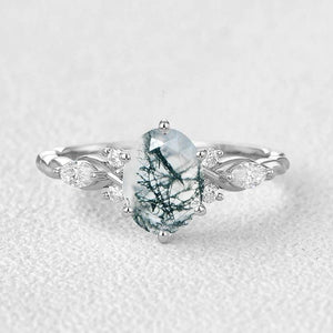 Flora’s Eternal | Oval Moss Agate Infinity Engagement Ring.